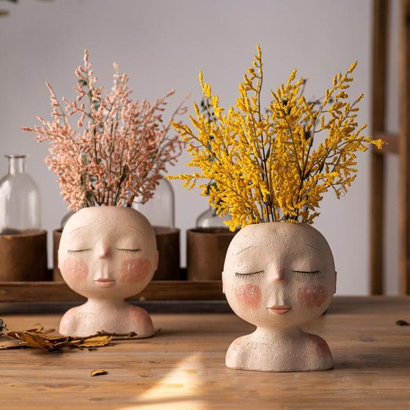 Human face flower pot